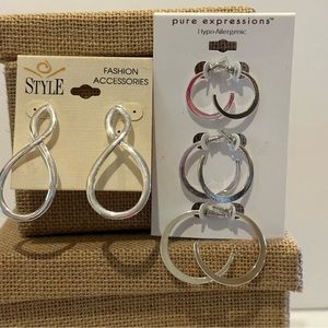 NWT 2 packs - 4 total pairs of silver tone earrings. Classic Hoop style 3 sizes